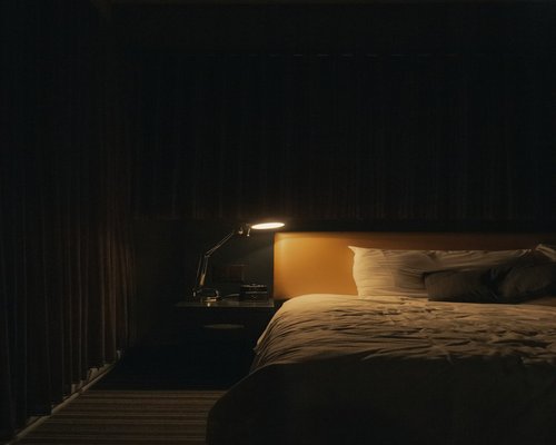 Cozy and peaceful bedroom interior prepared for a good night sleep